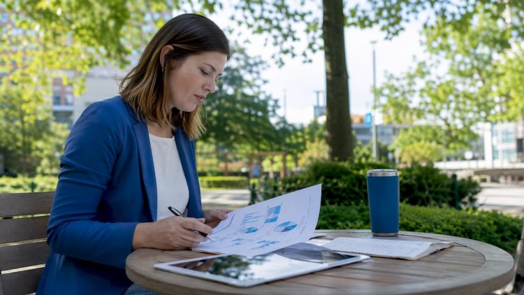 Marketing manager reviewing PPC pricing reports