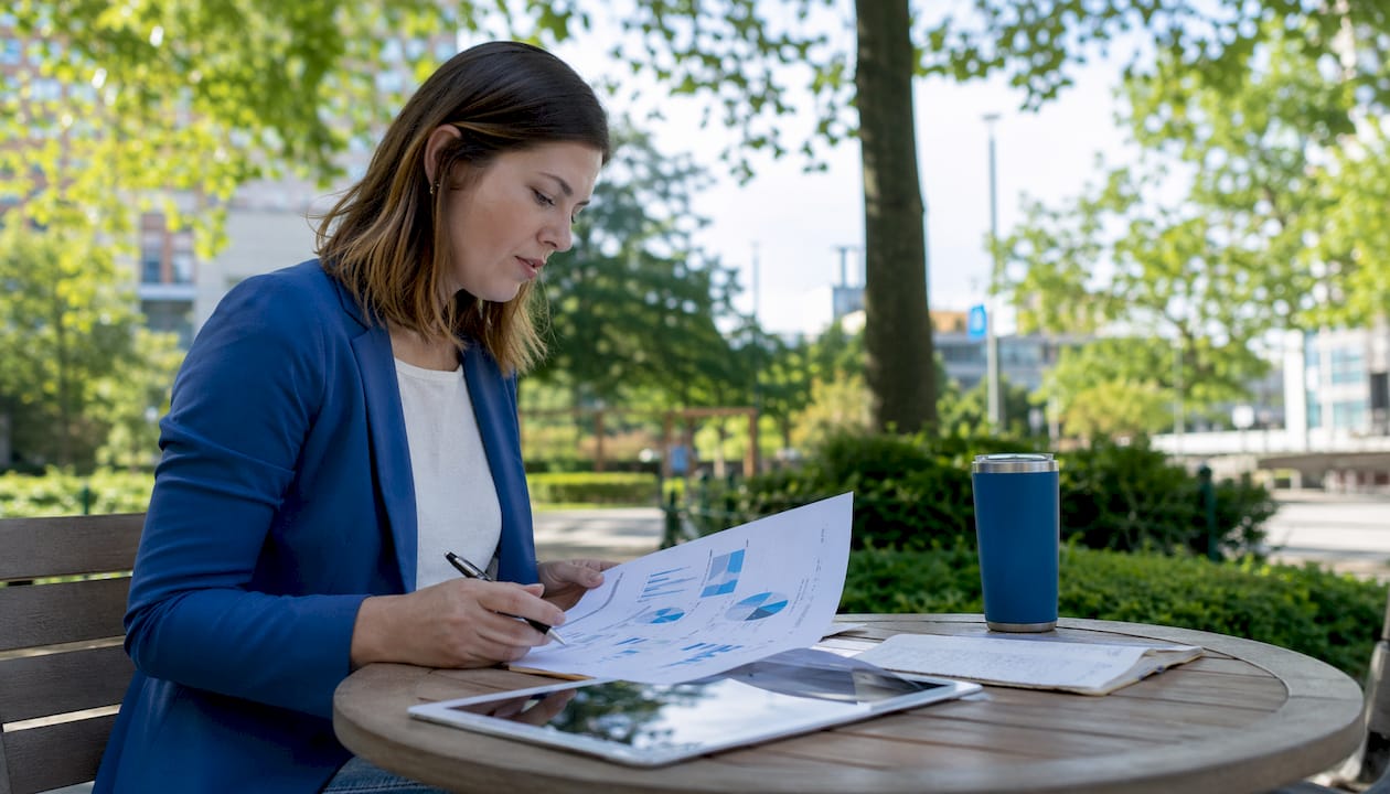 Marketing manager reviewing PPC pricing reports