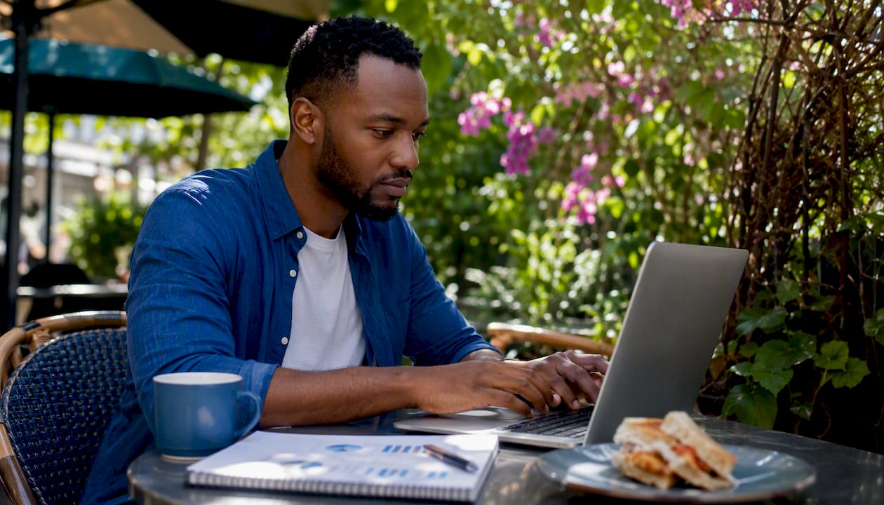 Data analyst typing measuring AI SEO KPIs on laptop
