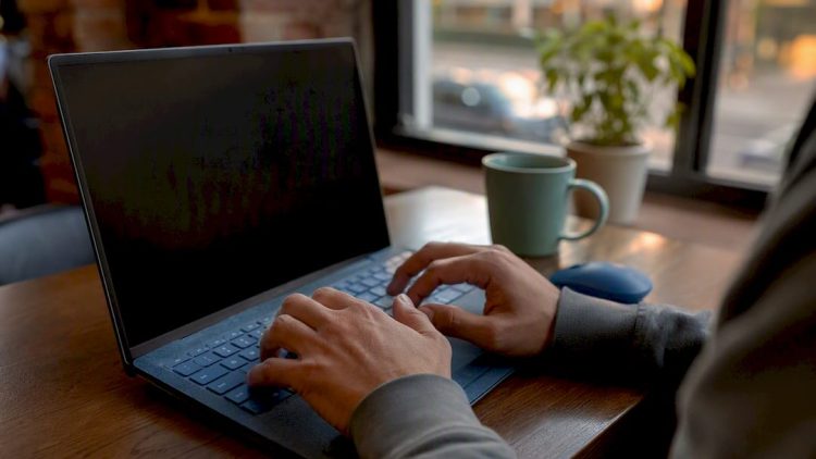 Hands on keyboard navigating website accessibility