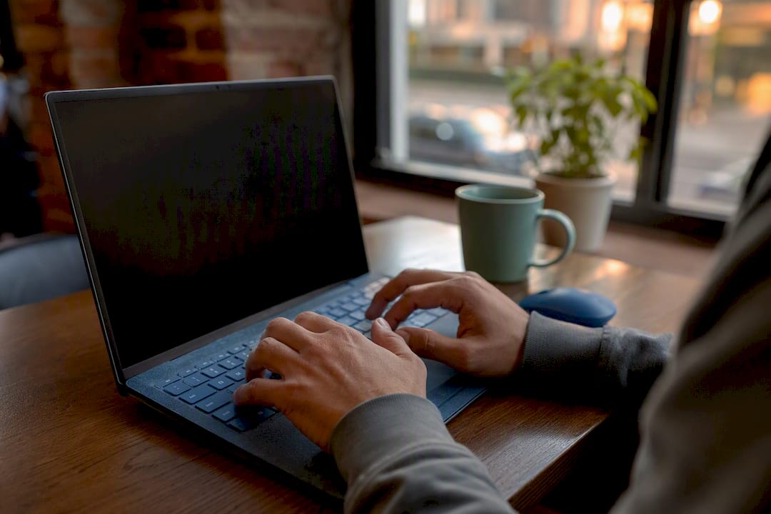 Hands on keyboard navigating website accessibility