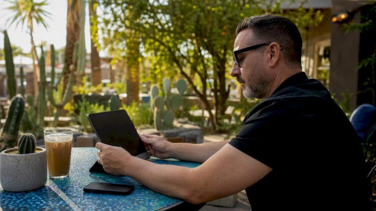 Small business owner planning digital PPC campaign