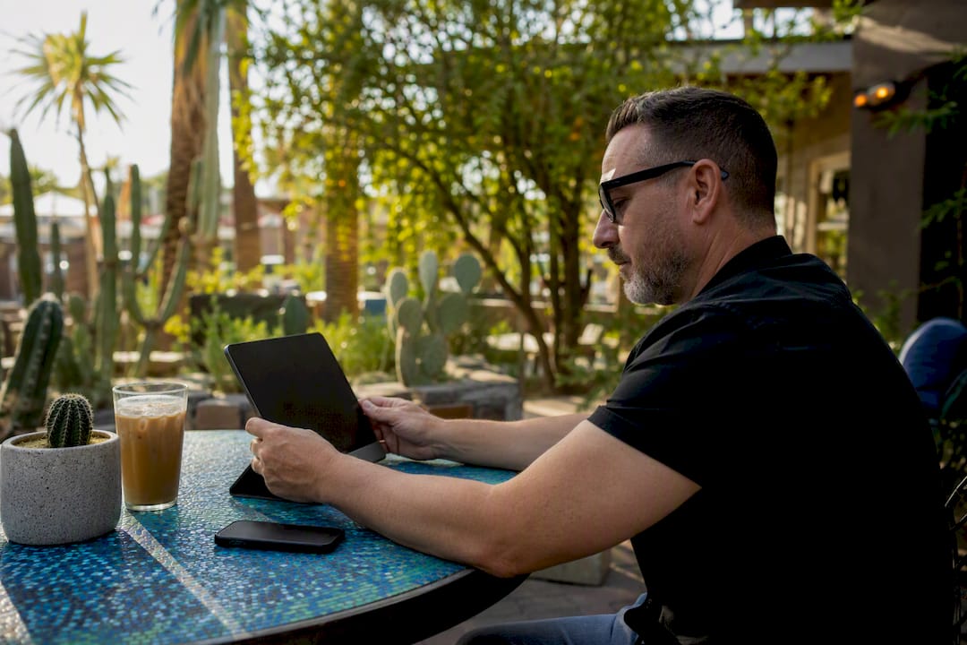 Small business owner planning digital PPC campaign